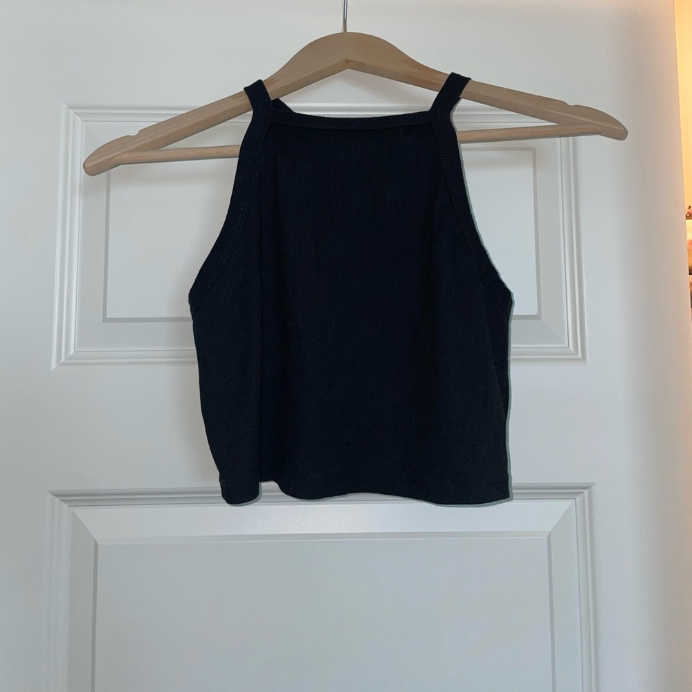 Black tank top cropped.